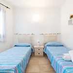 Cozy Veranda Retreat Near Budoni Apartment Tanaunella